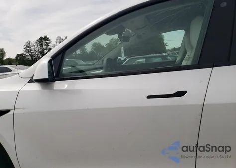 2022 Tesla Model Y from USA, damaged, VIN 7SAYGAEE2NF359242